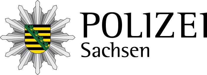 Offizielles Logo der Polizei Sachsen mit Stern und dem Landeswappen in schwarz gelb mit grüner Raute